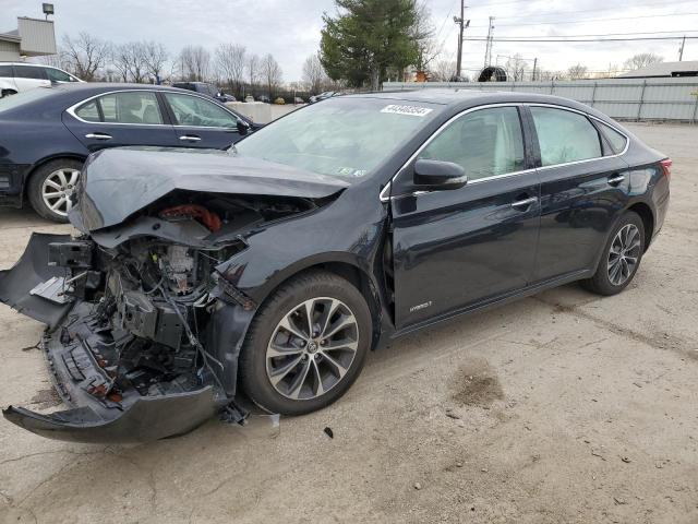 TOYOTA AVALON HYB 2017 with VIN 4T1BD1EB3HU058021 - Photo from auction