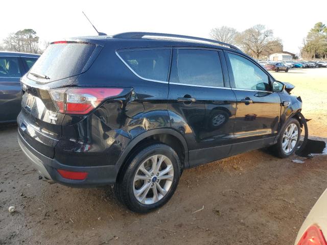 Photo 3 from auction – 2017 FORD ESCAPE SE with VIN 1FMCU9G92HUD68190