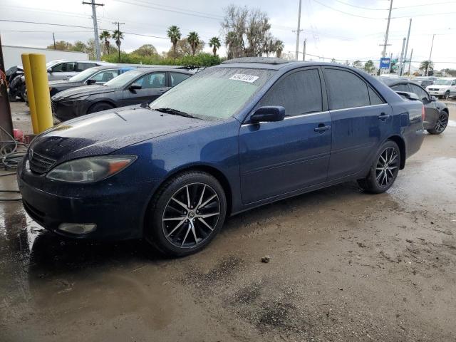 TOYOTA CAMRY LE 2002 with VIN JTDBF30K520005613 - Photo from auction