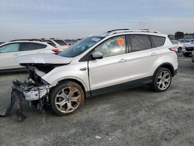 FORD ESCAPE TIT 2017 with VIN 1FMCU9J98HUC11644 - Photo from auction