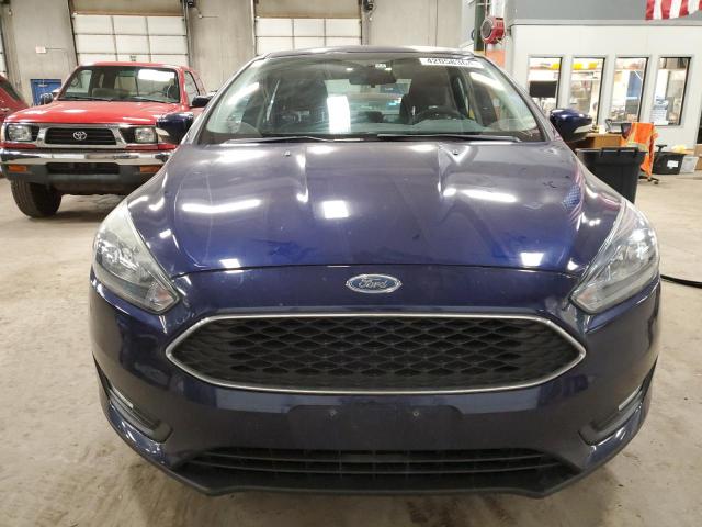 Foto 5 de la subasta – 2017 FORD FOCUS SEL con VIN 1FADP3H28HL213301