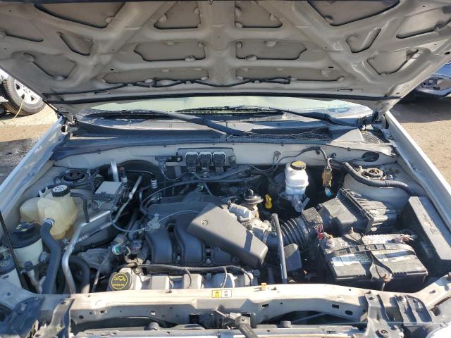 Photo 12 from auction – 2006 MERCURY MARINER with VIN 4M2YU57136DJ05646