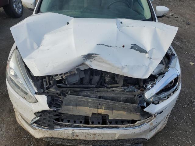 Photo 11 from auction – 2015 FORD FOCUS SE with VIN 1FADP3F24FL312939