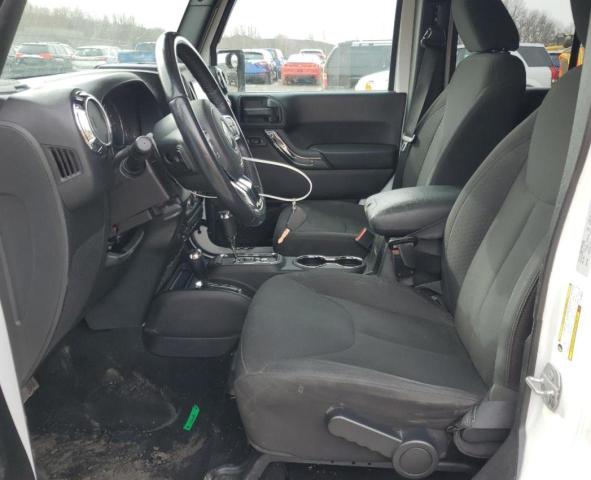 Photo 7 from auction – 2016 JEEP WRANGLER U with VIN 1C4BJWDG4GL166515