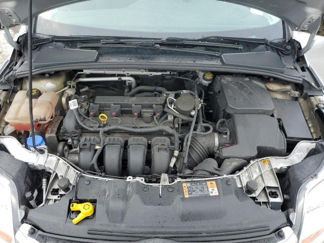 Photo 11 from auction – 2014 FORD FOCUS SE with VIN 1FADP3F2XEL273594