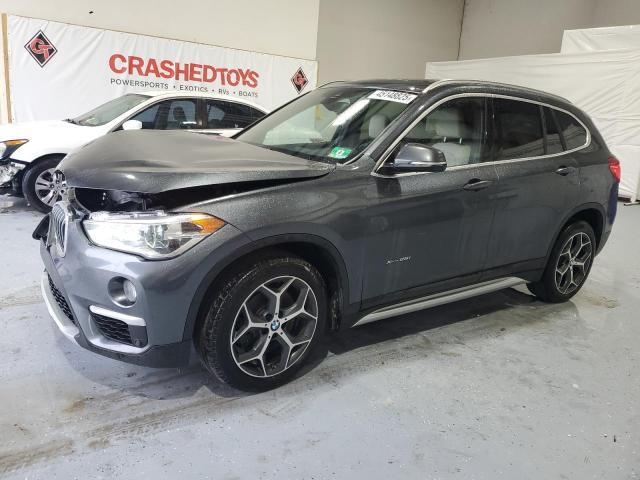 BMW X1 XDRIVE2 2017 with VIN WBXHT3C38H5F73265 - Photo from auction