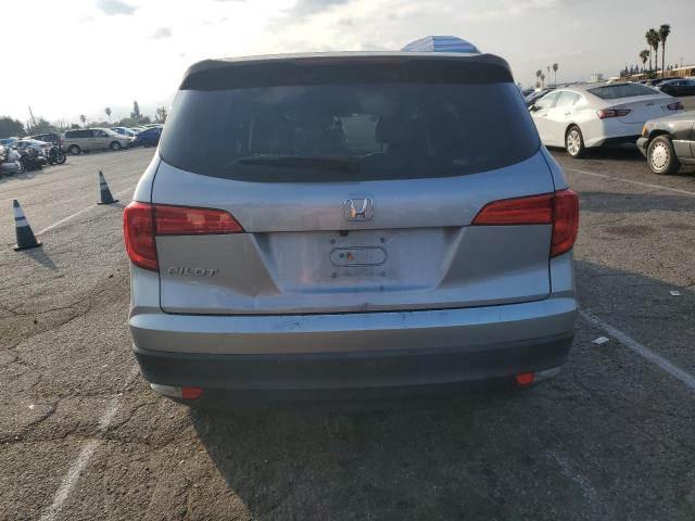 Photo 6 from auction – 2018 HONDA PILOT LX with VIN 5FNYF5H13JB009662