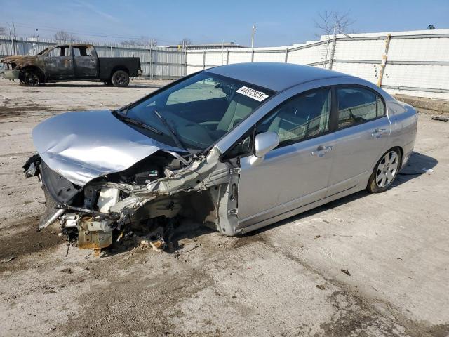 HONDA CIVIC LX 2011 with VIN 19XFA1F5XBE000517 - Photo from auction