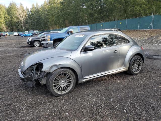 VOLKSWAGEN BEETLE 2013 with VIN 3VWJP7AT9DM613946 - Photo from auction