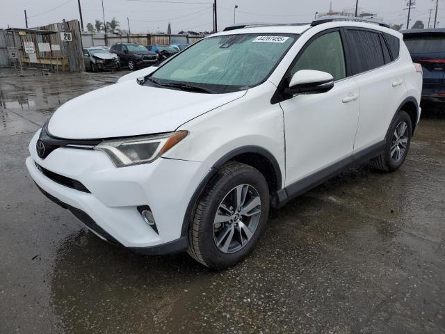 TOYOTA RAV4 XLE 2017 with VIN JTMWFREV9HJ139048 - Photo from auction
