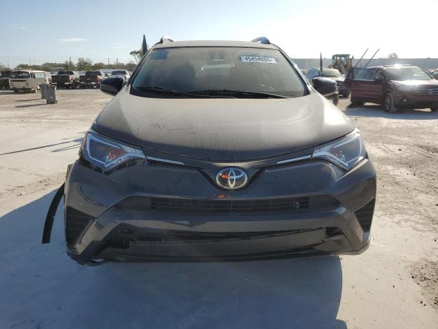 Photo 5 from auction – 2017 TOYOTA RAV4 LE with VIN JTMZFREVXHJ720684