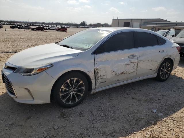 TOYOTA AVALON HYB 2016 with VIN 4T1BD1EB8GU049362 - Photo from auction