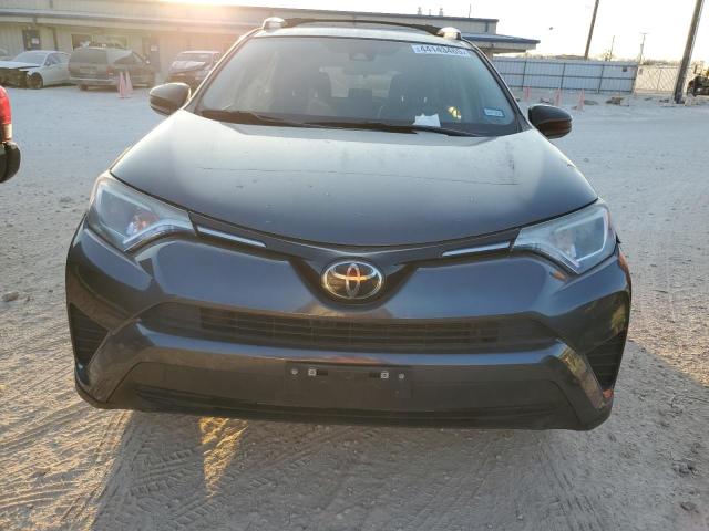 Photo 5 from auction – 2018 TOYOTA RAV4 LE with VIN 2T3BFREVXJW772311