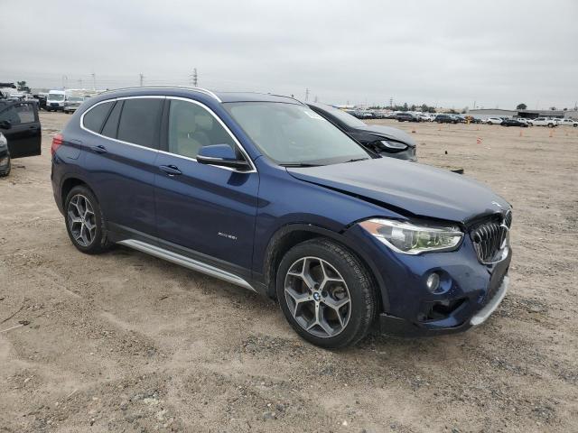 Photo 4 from auction – 2016 BMW X1 XDRIVE2 with VIN WBXHT3C36G5E55424