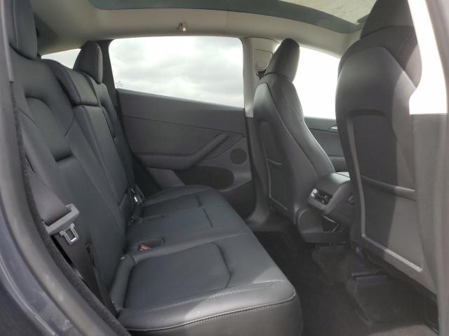Photo 11 from auction – 2023 TESLA MODEL Y with VIN 7SAYGDEE4PF850593