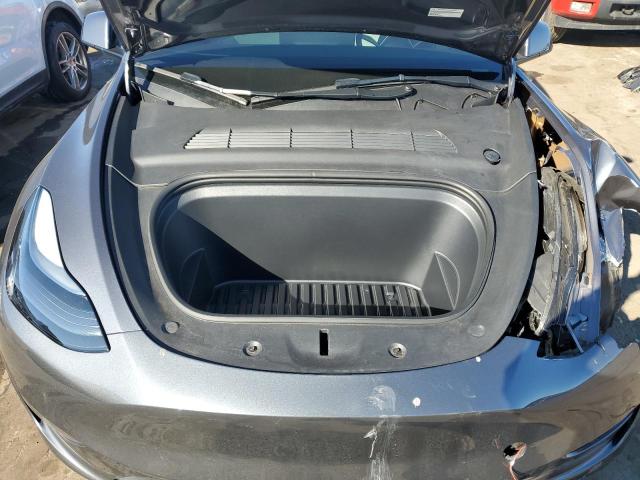Снимка 11 от търг – 2023 TESLA MODEL Y с VIN 7SAYGDEF0PF897600
