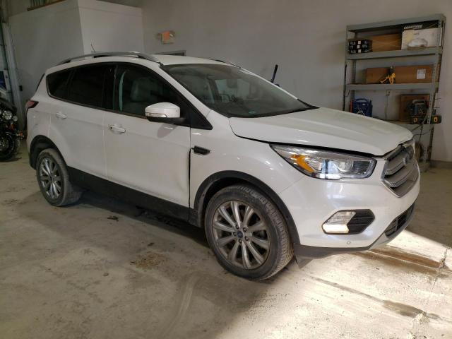 Photo 4 from auction – 2018 FORD ESCAPE TIT with VIN 1FMCU9J90JUD01070