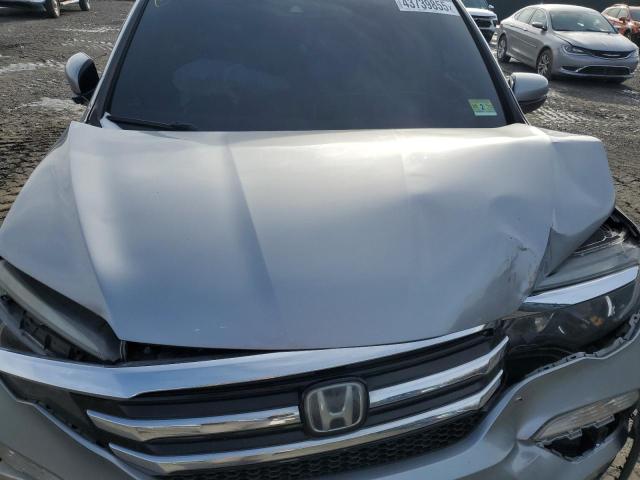 Photo 12 from auction – 2016 HONDA PILOT TOUR with VIN 5FNYF6H98GB127422