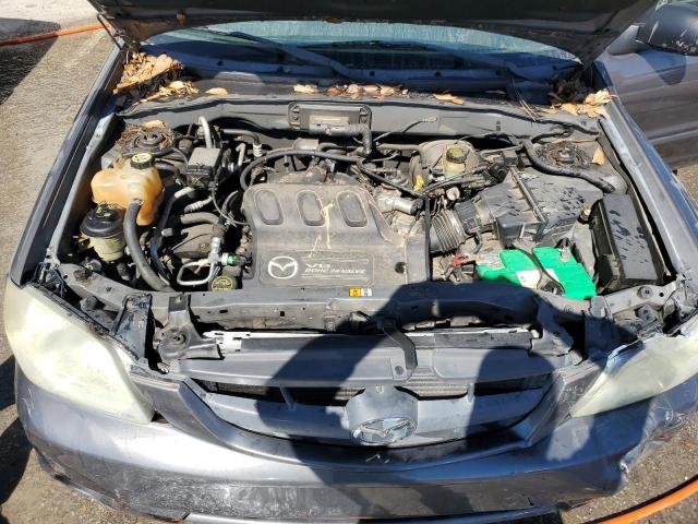 Photo 11 from auction – 2004 MAZDA TRIBUTE ES with VIN 4F2CZ06104KM02999
