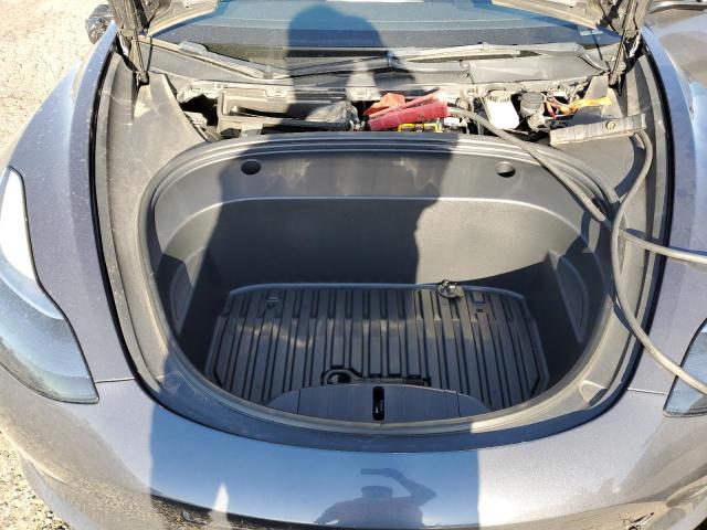 Photo 11 from auction – 2022 TESLA MODEL 3 with VIN 5YJ3E1EB7NF136763