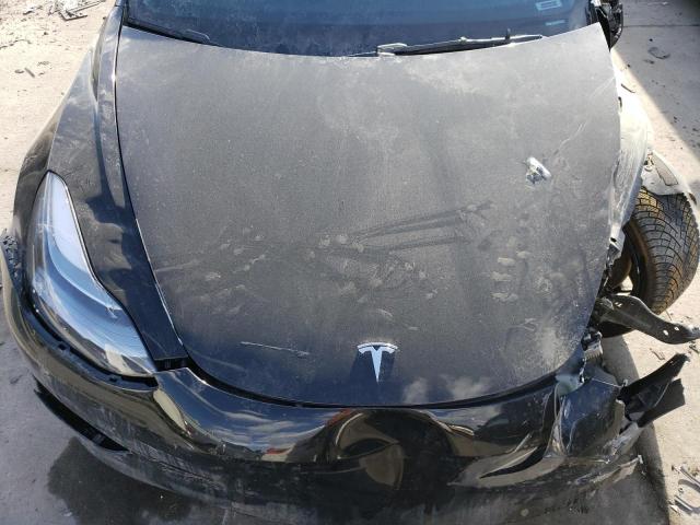 Снимка 11 от търг – 2022 TESLA MODEL 3 с VIN 5YJ3E1EC2NF253739