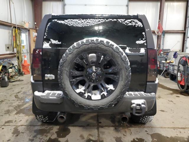 Photo 6 from auction – 2006 HUMMER H3 with VIN 5GTDN136X68157322