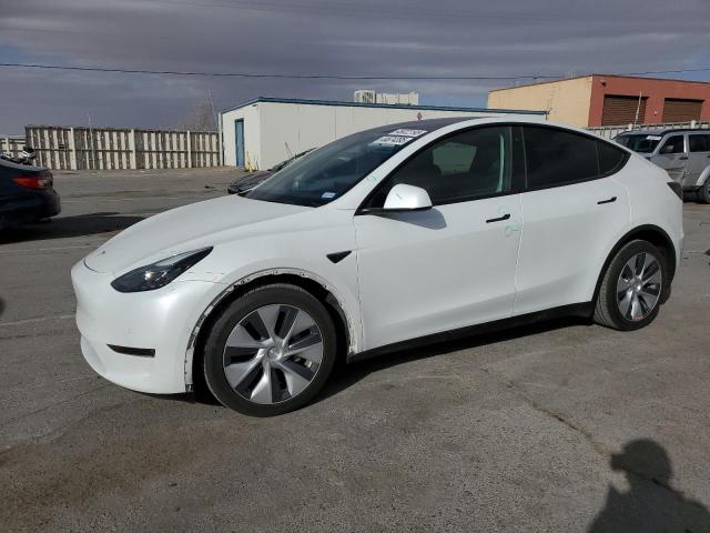 TESLA MODEL Y 2022 with VIN 7SAYGAEE4NF517757 - Photo from auction