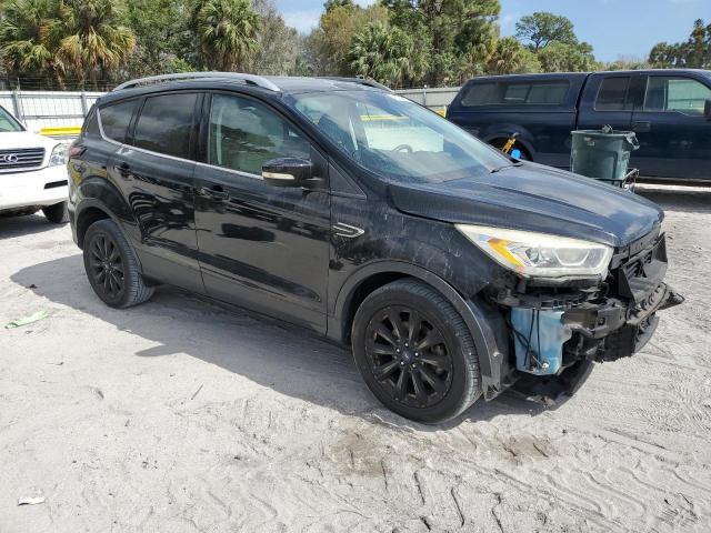 Photo 4 from auction – 2017 FORD ESCAPE TIT with VIN 1FMCU0JD6HUD72977
