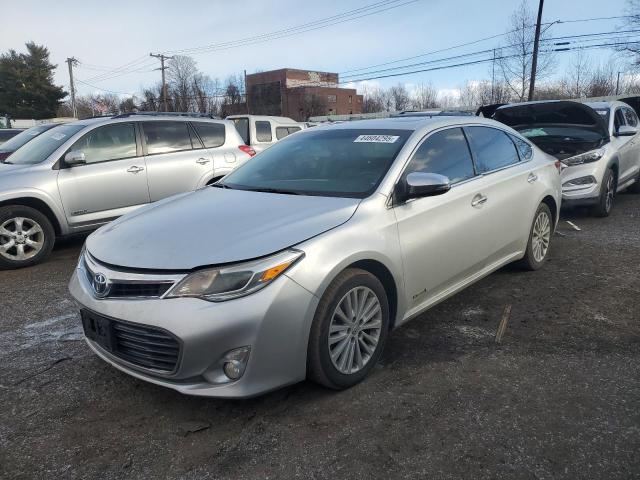 TOYOTA AVALON HYB 2014 with VIN 4T1BD1EB0EU032018 - Photo from auction