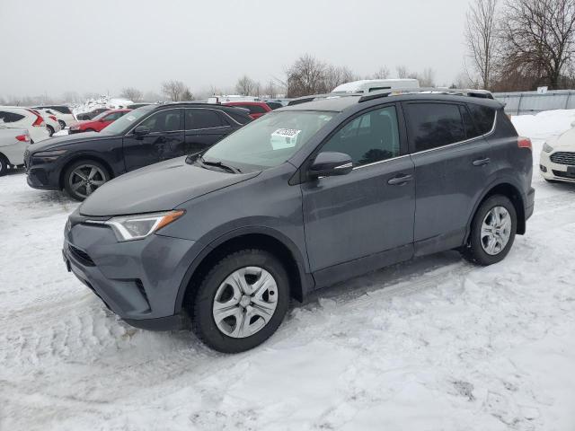 TOYOTA RAV4 LE 2017 with VIN 2T3ZFREV9HW400029 - Photo from auction
