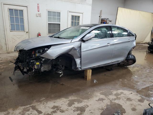 HYUNDAI SONATA HYB 2015 with VIN KMHEC4A40FA124564 - Photo from auction