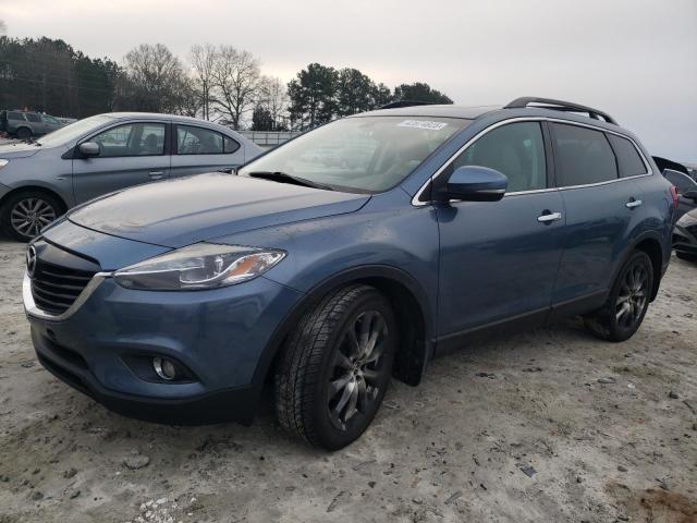 MAZDA CX-9 GRAND 2015 with VIN JM3TB3DAXF0457846 - Photo from auction