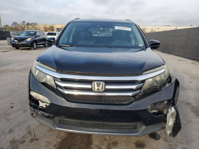 Photo 5 from auction – 2017 HONDA PILOT TOUR with VIN 5FNYF6H91HB024411