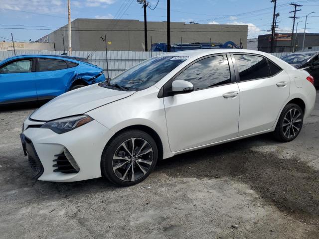 TOYOTA COROLLA L 2018 with VIN 5YFBURHE5JP815870 - Photo from auction