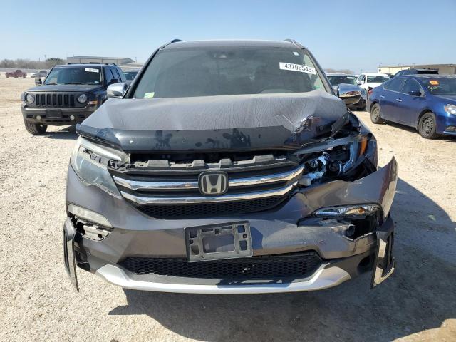 Photo 5 from auction – 2016 HONDA PILOT ELIT with VIN 5FNYF6H02GB002479