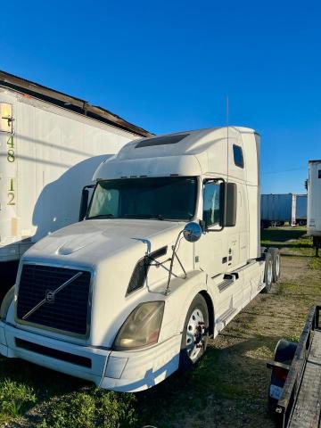 Photo 2 from auction – 2011 VOLVO VN VNL with VIN 4V4NC9EJ3BN534378