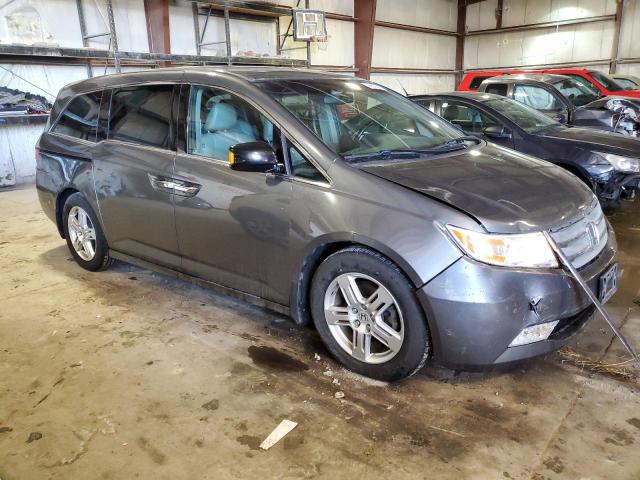 Photo 4 from auction – 2011 HONDA ODYSSEY TO with VIN 5FNRL5H94BB090661