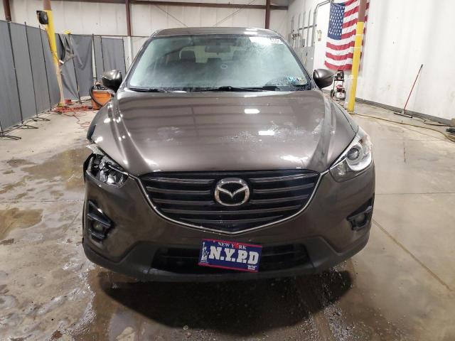 Photo 5 from auction – 2016 MAZDA CX-5 TOURI with VIN JM3KE4CY0G0862185