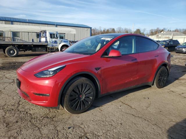 TESLA MODEL Y 2023 with VIN 7SAYGAEE1PF776449 - Photo from auction