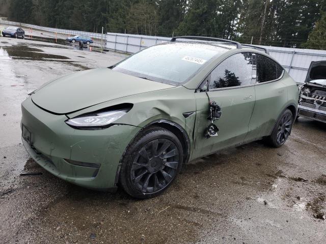 TESLA MODEL Y 2022 z numerem VIN 7SAYGAEE9NF484190 - Zdjęcie z aukcji