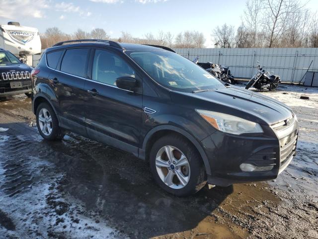 Photo 4 from auction – 2014 FORD ESCAPE SE with VIN 1FMCU9GXXEUE01317