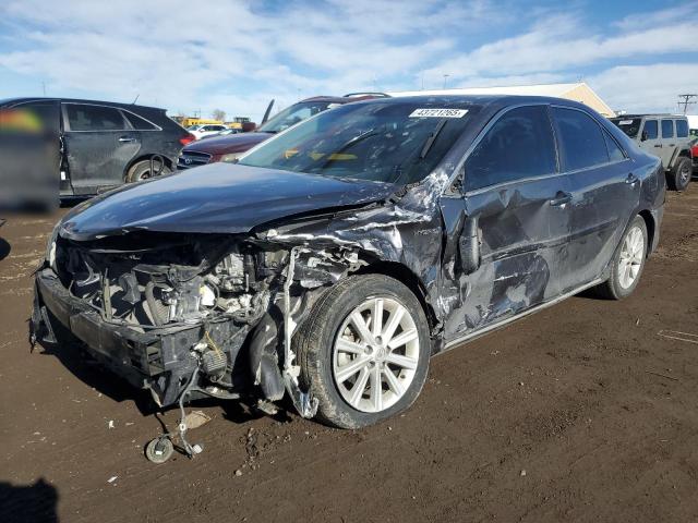 TOYOTA CAMRY HYBR 2014 with VIN 4T1BD1FK7EU100944 - Photo from auction
