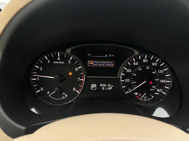 Photo 8 from auction – 2015 NISSAN ALTIMA 2.5 with VIN 1N4AL3AP5FC102657