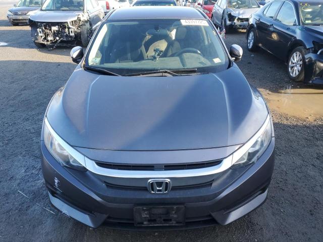 Photo 5 from auction – 2018 HONDA CIVIC LX with VIN 2HGFC2F58JH584582
