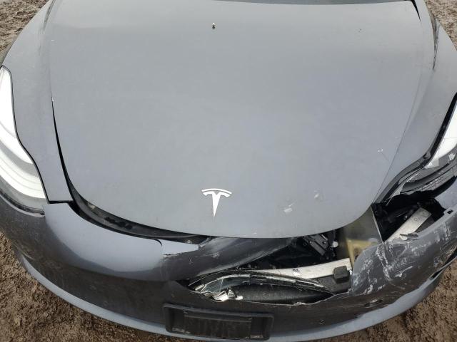 Снимка 11 от търг – 2018 TESLA MODEL 3 с VIN 5YJ3E1EB6JF055196