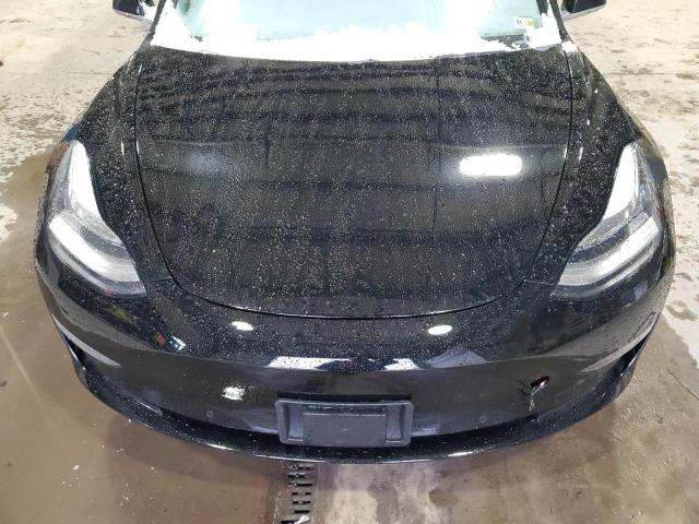 Photo 11 from auction – 2018 TESLA MODEL 3 with VIN 5YJ3E1EAXJF033791