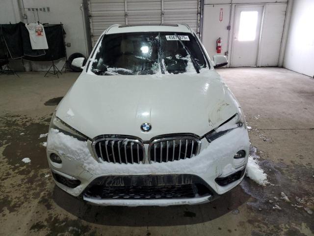 Photo 5 from auction – 2016 BMW X1 XDRIVE2 with VIN WBXHT3C31G5F63899