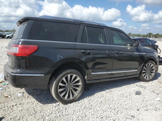 Photo 3 from auction – 2021 LINCOLN NAVIGATOR with VIN 5LMJJ2KT2MEL02847