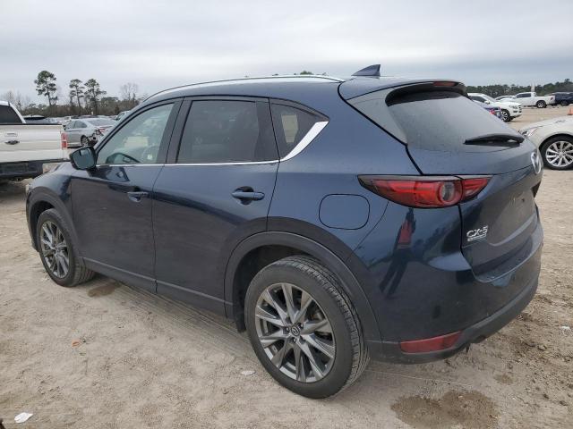 Photo 2 from auction – 2021 MAZDA CX-5 SIGNA with VIN JM3KFBEY9M0343758
