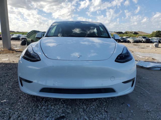 Photo 5 from auction – 2022 TESLA MODEL Y with VIN 7SAYGDEF9NF319525
